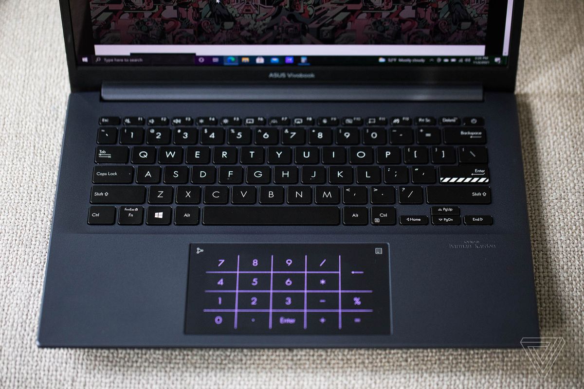 The keyboard of the Asus Vivobook Pro 14 with the illuminated number pad seen from above.