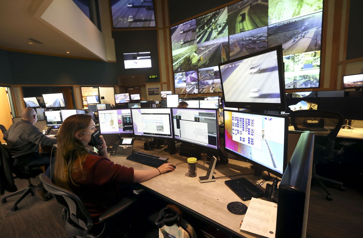 Nicole McCleery, Utah Department of Transportation traffic management specialist, monitors traffic flow, traffic cameras and radios at the UDOT Operations Center in Salt Lake City on Monday, Jan. 24, 2022.