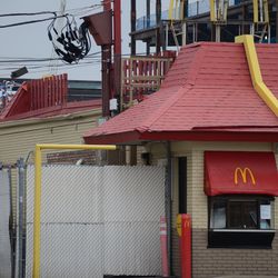 3:41 p.m. A portion of the rooftop fencing, in the back of former McDonalds, was removed to allow rooftop mechanical equipment to be removed from the building -