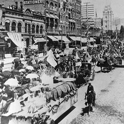 The Pioneer Days Parade makes its way down Salt Lake City’s Main Street on July 24, 1897. It was a hot day as all the parasols came out to protect the parade watchers.