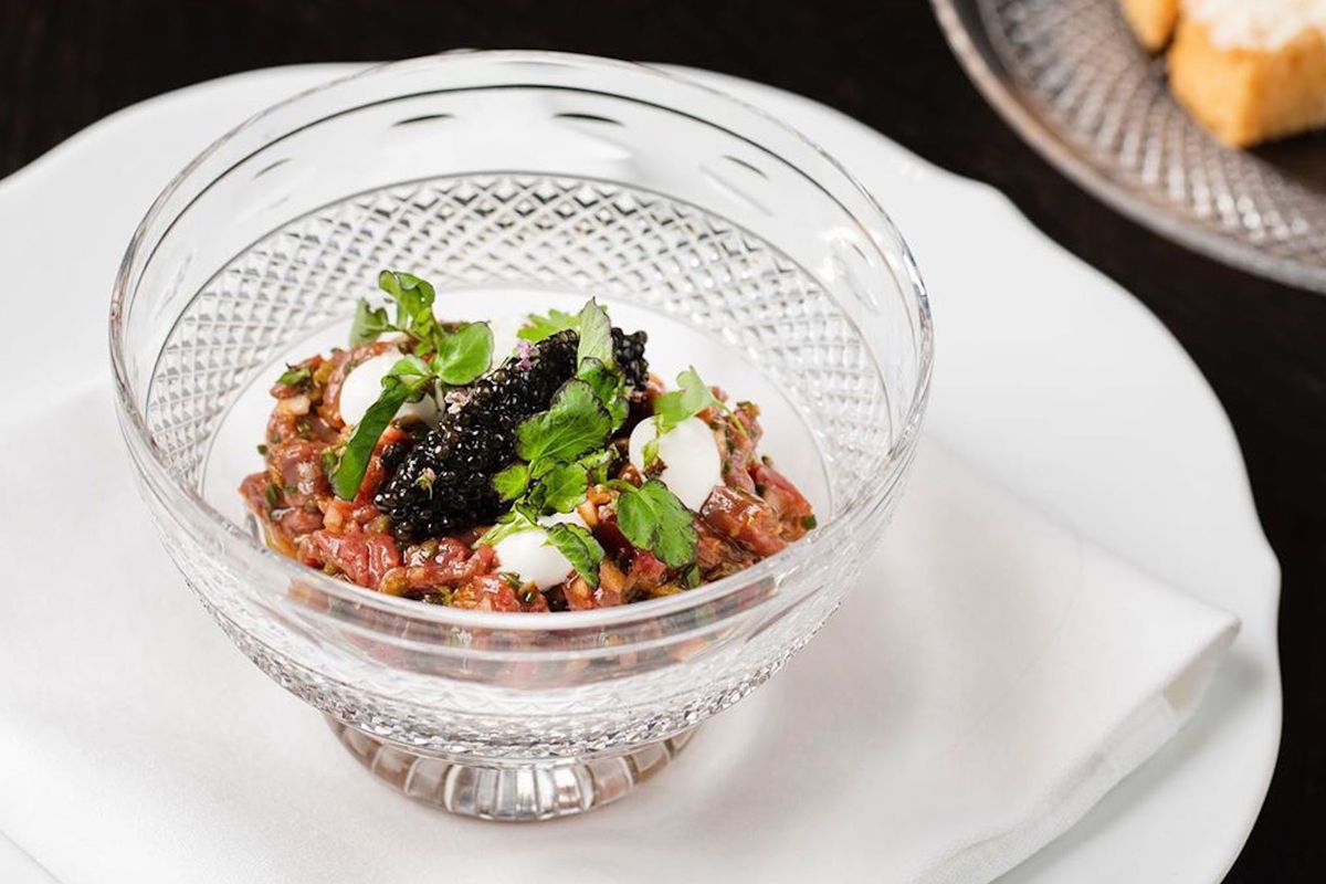 Steak tartare with caviar in a glass bowl at Jason Atherton’s The Betterment