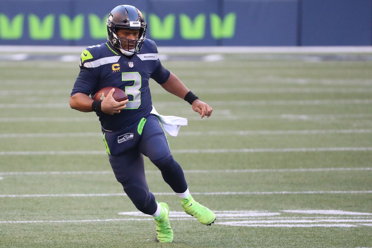 Quarterback Russell Wilson #3 of the Seattle Seahawks runs with the ball against the San Francisco 49ers in the third quarter of the game at CenturyLink Field on November 01, 2020 in Seattle, Washington.