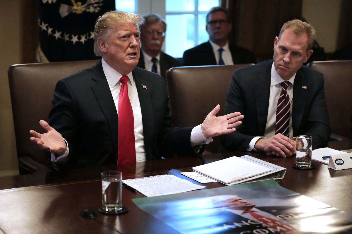 President Donald Trump talks to journalists during a meeting with members of his Cabinet, including acting Defense Secretary Patrick Shanahan, at the White House on January 2, 2019.