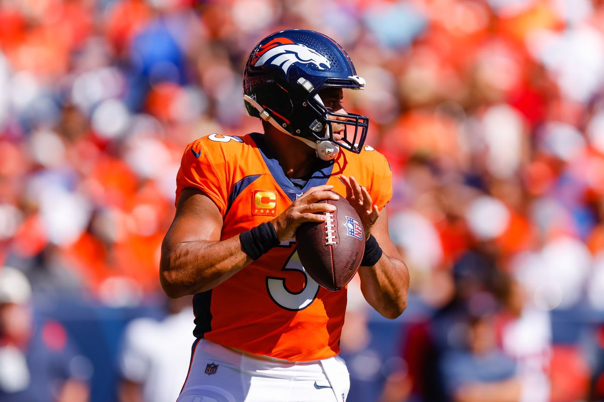 Quarterback Russell Wilson #3 of the Denver Broncos drops back to pass during the first quarter against the Houston Texans at Empower Field at Mile High on September 18, 2022 in Denver, Colorado.