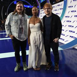 Jason Koenig, from left, Jennie Pegouskie and Ed Sheeran arrive at the MTV Video Music Awards at The Forum on Sunday, Aug. 27, 2017, in Inglewood, Calif.