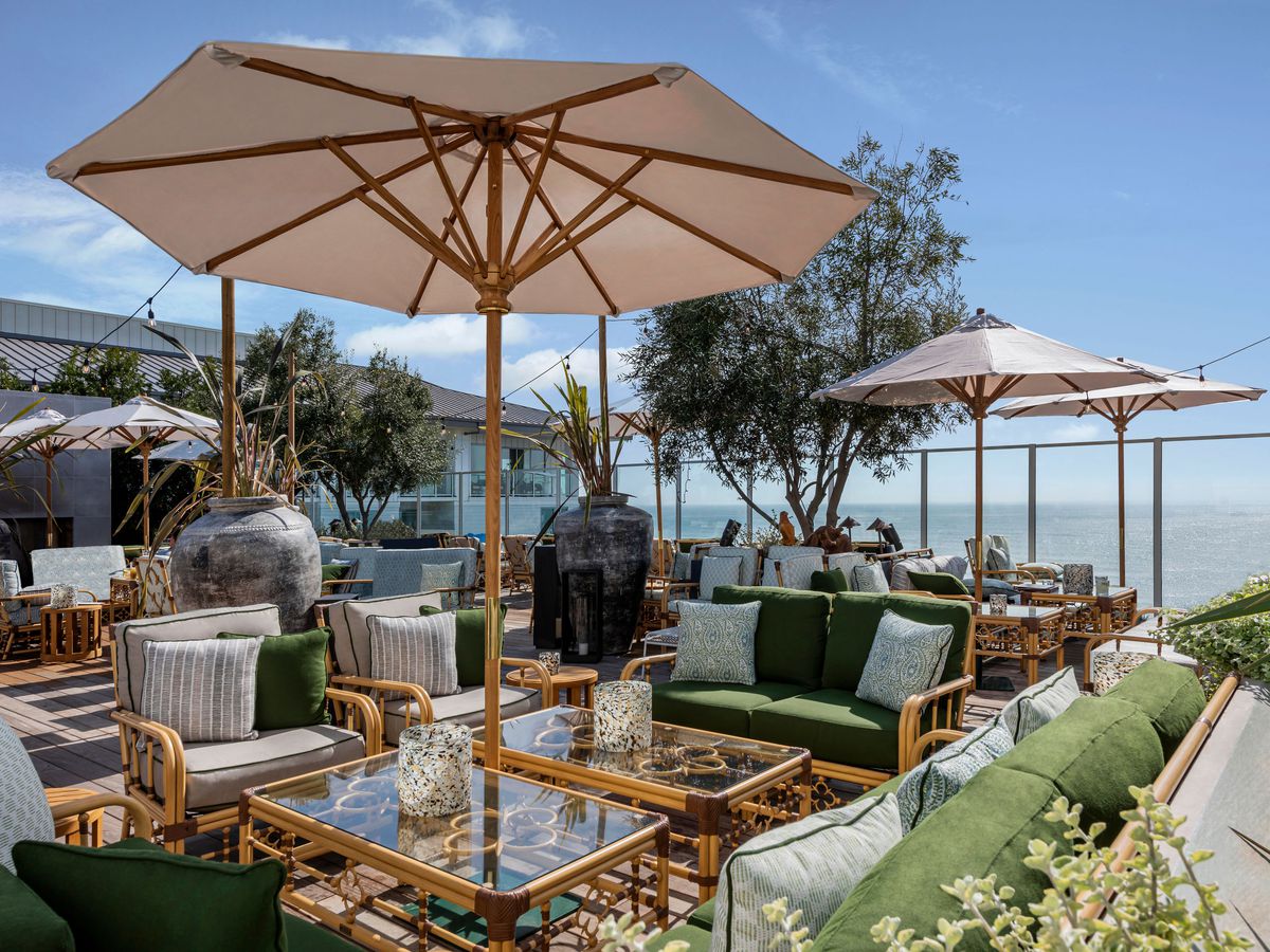 Umbrellas, landscaping and lounge seating at Oceanside’s Rooftop Bar.