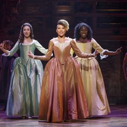(l-r) Solea Pfeiffer as Eliza Hamilton; Emmy Raver-Lampman as Angelica Schuyler; Amber Iman as Peggy Schuyler in a touring production of "Hamilton" on stage at the Orpheum Theatre in Memphis, TN. The hit musical will play at Salt Lake's Eccles Theater from April 11-May 6.