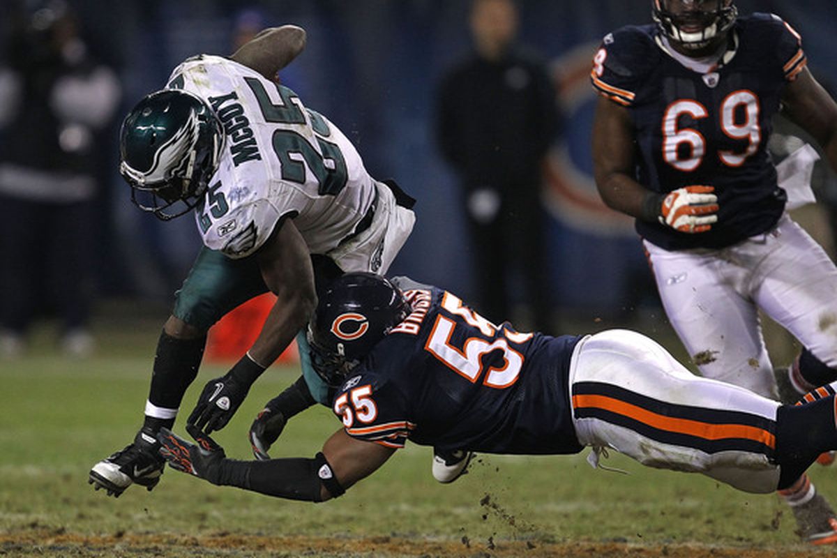 CHICAGO - NOVEMBER 28: Lance Briggs #55 of the Chicago Bears tackles  LeSean McCoy #25 of the Philadelphia Eagles at Soldier Field on November 28 2010 in Chicago Illinois. The Bears defeated the Eagles 31-26. (Photo by Jonathan Daniel/Getty Images)