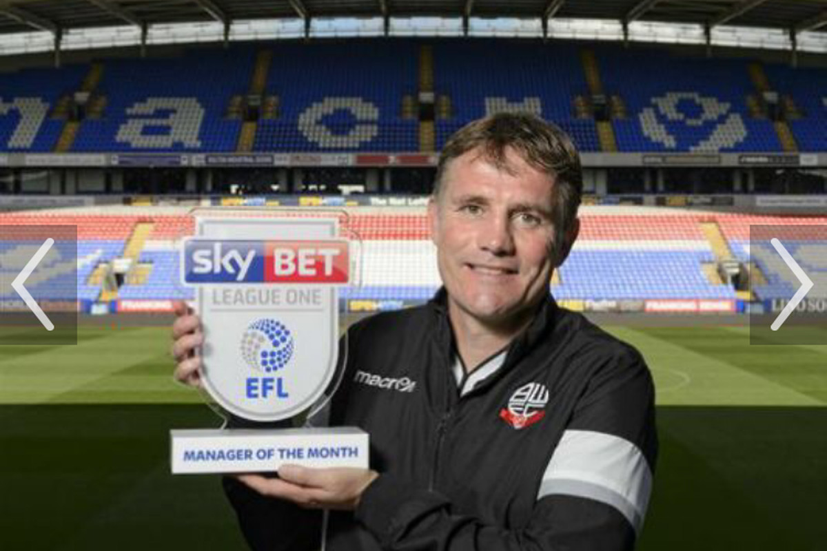 Phil Parkinson. Bolton manager who played for Bury 