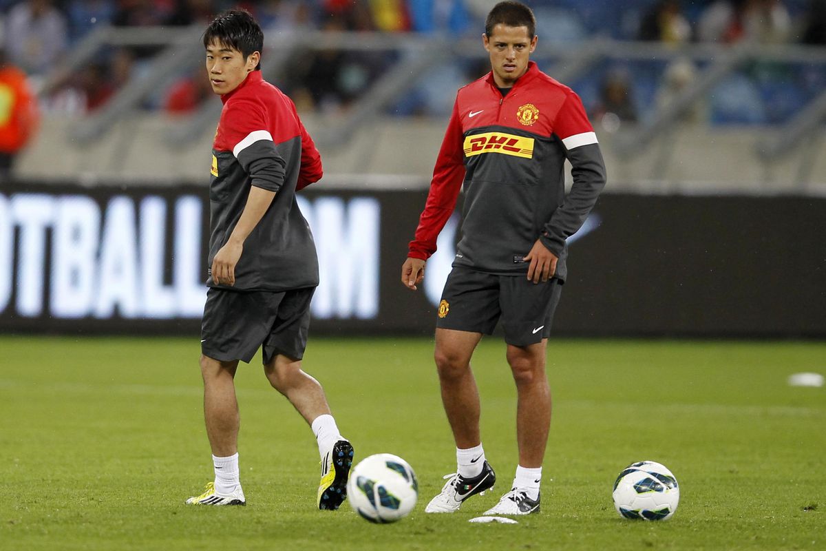 DURBAN, SOUTH AFRICA. - JULY 17:  Shinji Kagawa and Javier Hernandez (R) during the Manchester United training session at Moses Mabhida Stadium on July 17, 2012 in Durban, South Africa..(Photo by Anesh Debiky/Gallo Images/Getty Images)