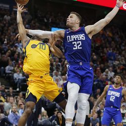 LA Clippers forward Blake Griffin fouls Utah Jazz guard Alec Burks during NBA action in Salt Lake City on Saturday, Jan. 20, 2018.