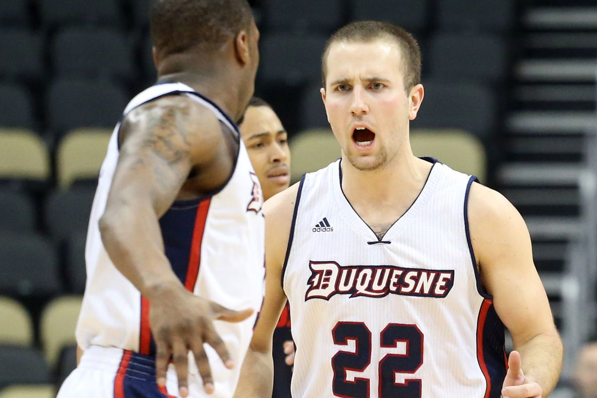 Duquesne's Micah Mason (#22) who scored 19 points in their victory against the Saint Louis Billikens in the Atlantic 10 Conference Tournament on Wednesday, March 11th, 2015