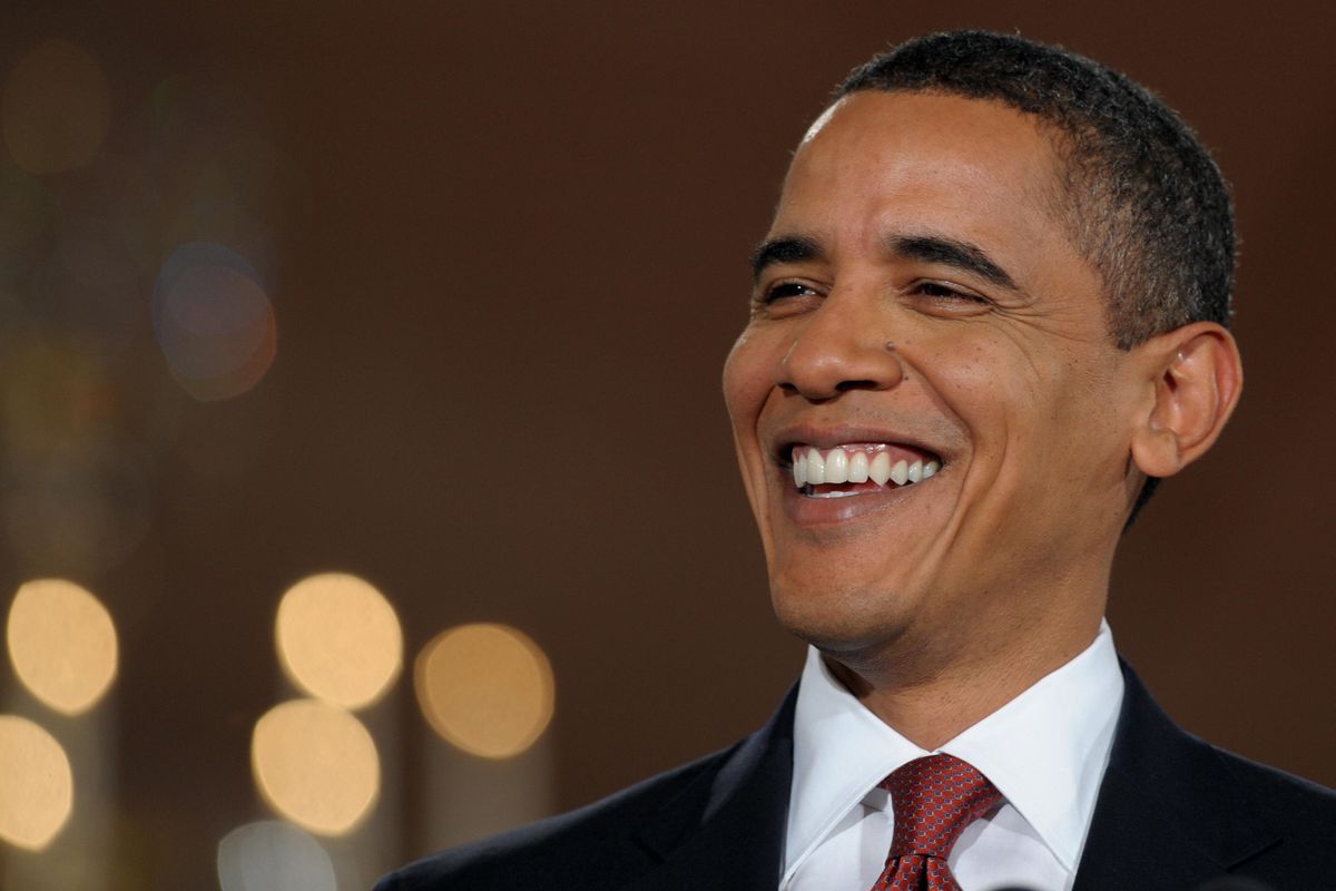 Barack Obama, smiling.