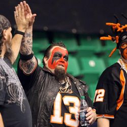 Utah Blaze fans, from left, Brian Lammers, Jared Repass and Jason Lammers, watch during a football game between the Utah Blaze and the San Jose SaberCats at EnergySolutions Arena in Salt Lake City on Saturday, June 29, 2013.