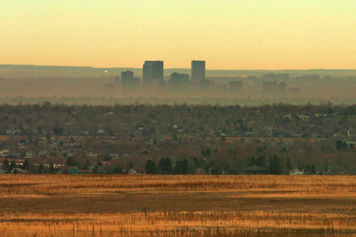 A brown cloud obscures the Denver skyline.
