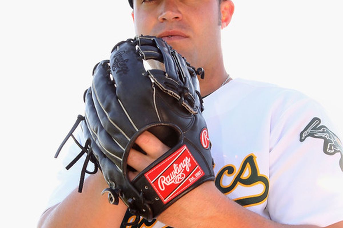 PHOENIX, AZ - FEBRUARY 27:  Pitcher Joey Devine #33 of the Oakland Athletics poses for a portrait during spring training photo day at Phoenix Municipal Stadium on February 27, 2012 in Phoenix, Arizona.  (Photo by Christian Petersen/Getty Images)