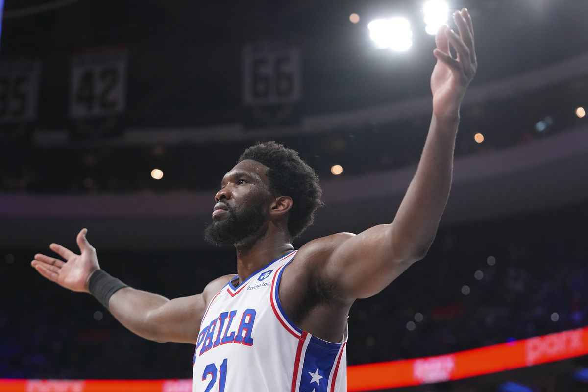 Philadelphia 76ers center Joel Embiid (21) reacts after making a basket and getting fouled against the Cleveland Cavaliers in the second half at the Wells Fargo Center.