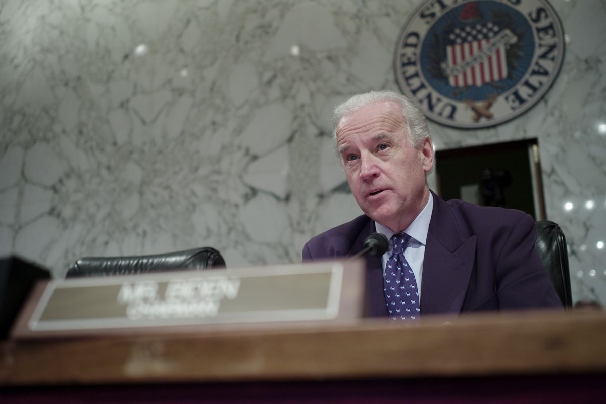Joe Biden sitting behind a table at a hearing in 2007.