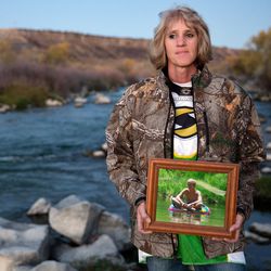 Lillie Kaster poses for a portrait with a picture of her son, Roger Vulgamore, on Thursday, Nov. 3, 2016, at the location where his ashes will be scattered in Buhl. Roger's organs went to five different recipients. "We know that was a gift he was willing to give," Kaster says.