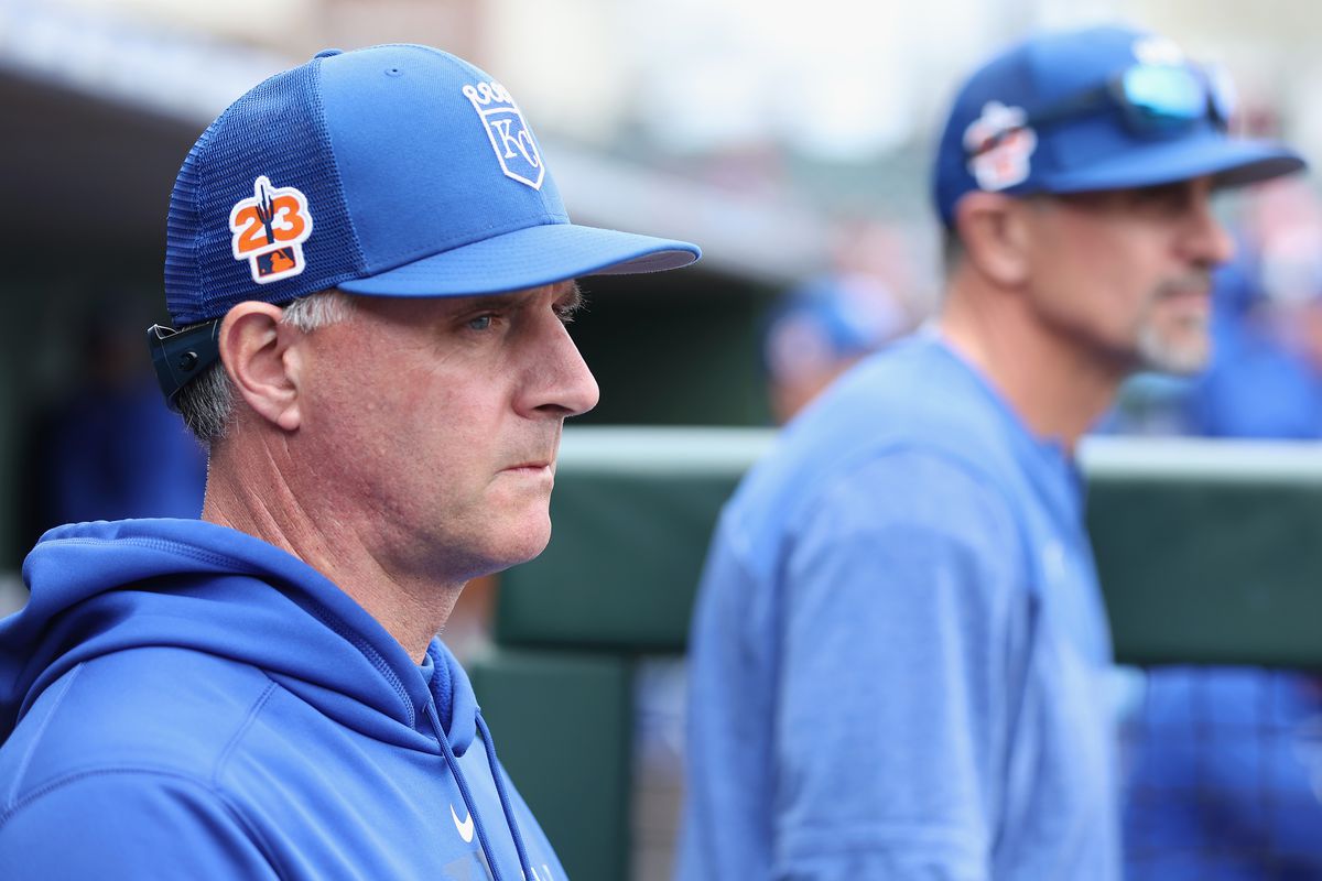 Manager Matt Quatraro #33 of the Kansas City Royals watches from the dugout during the third inning of the spring training game against the Los Angeles Angels at Surprise Stadium on March 02, 2023 in Surprise, Arizona.