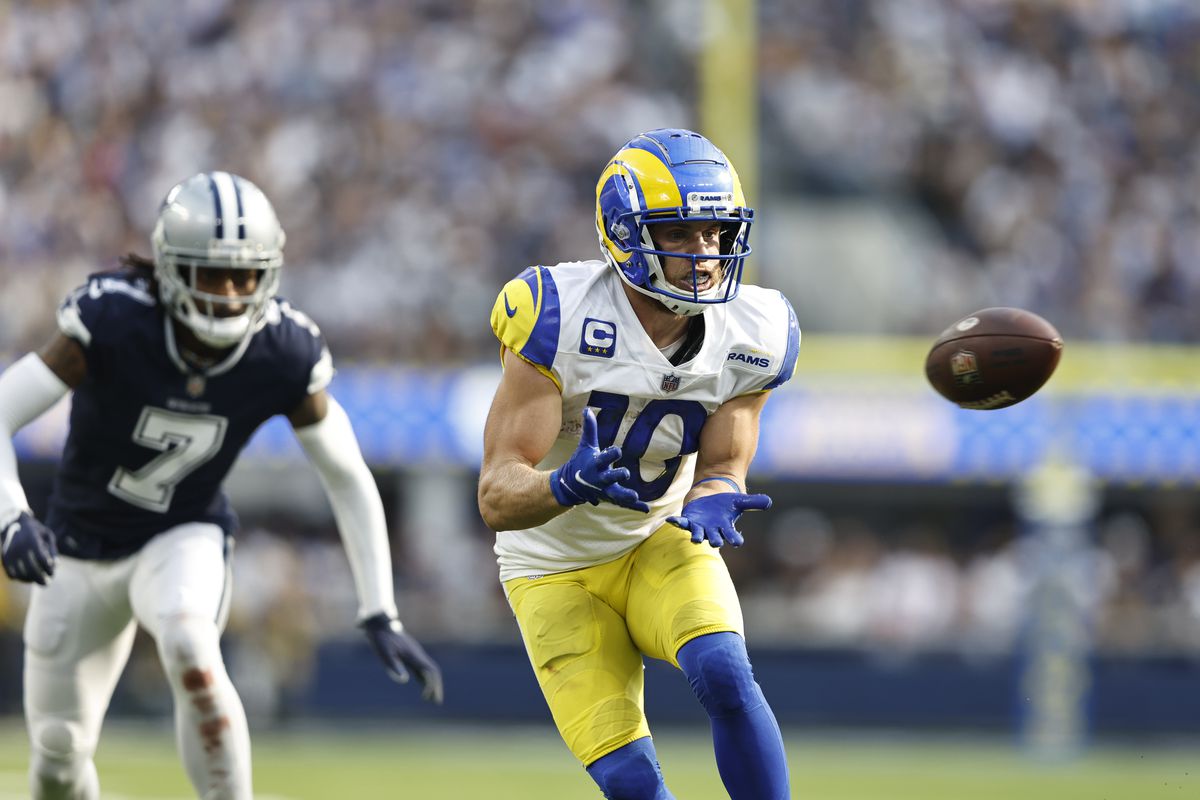 INGLEWOOD, CALIFORNIA - OCTOBER 09: Cooper Kupp #10 of the Los Angeles Rams catches a pass against Trevon Diggs #7 of the Dallas Cowboys during the second half of a game at SoFi Stadium on October 09, 2022 in Inglewood, California.