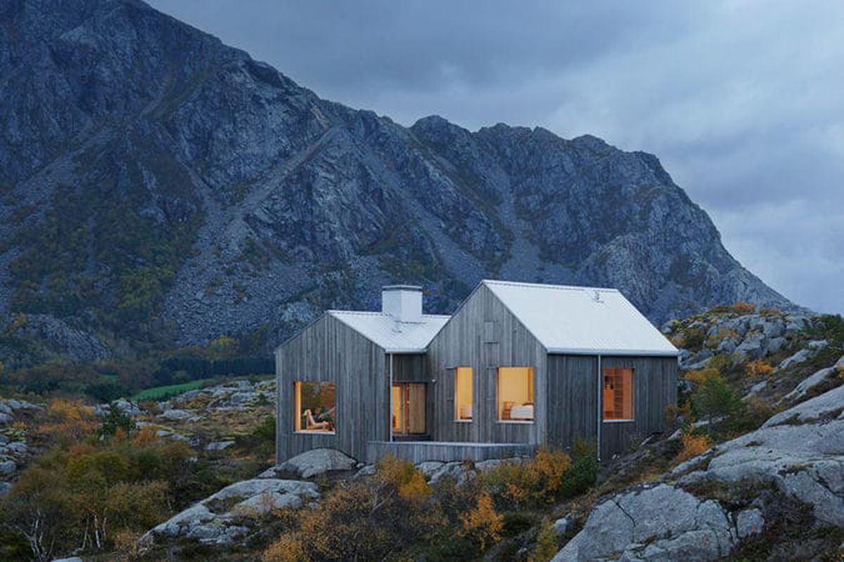 Timber house near rocky mountains