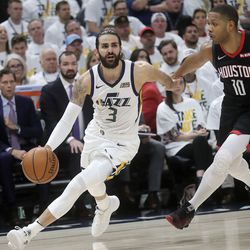 Utah Jazz guard Ricky Rubio (3) dribbles past Houston Rockets guard Eric Gordon (10) during Game 4 of the NBA Playoffs at the Vivint Smart Home Arena in Salt Lake City on Monday, April 22, 2019.