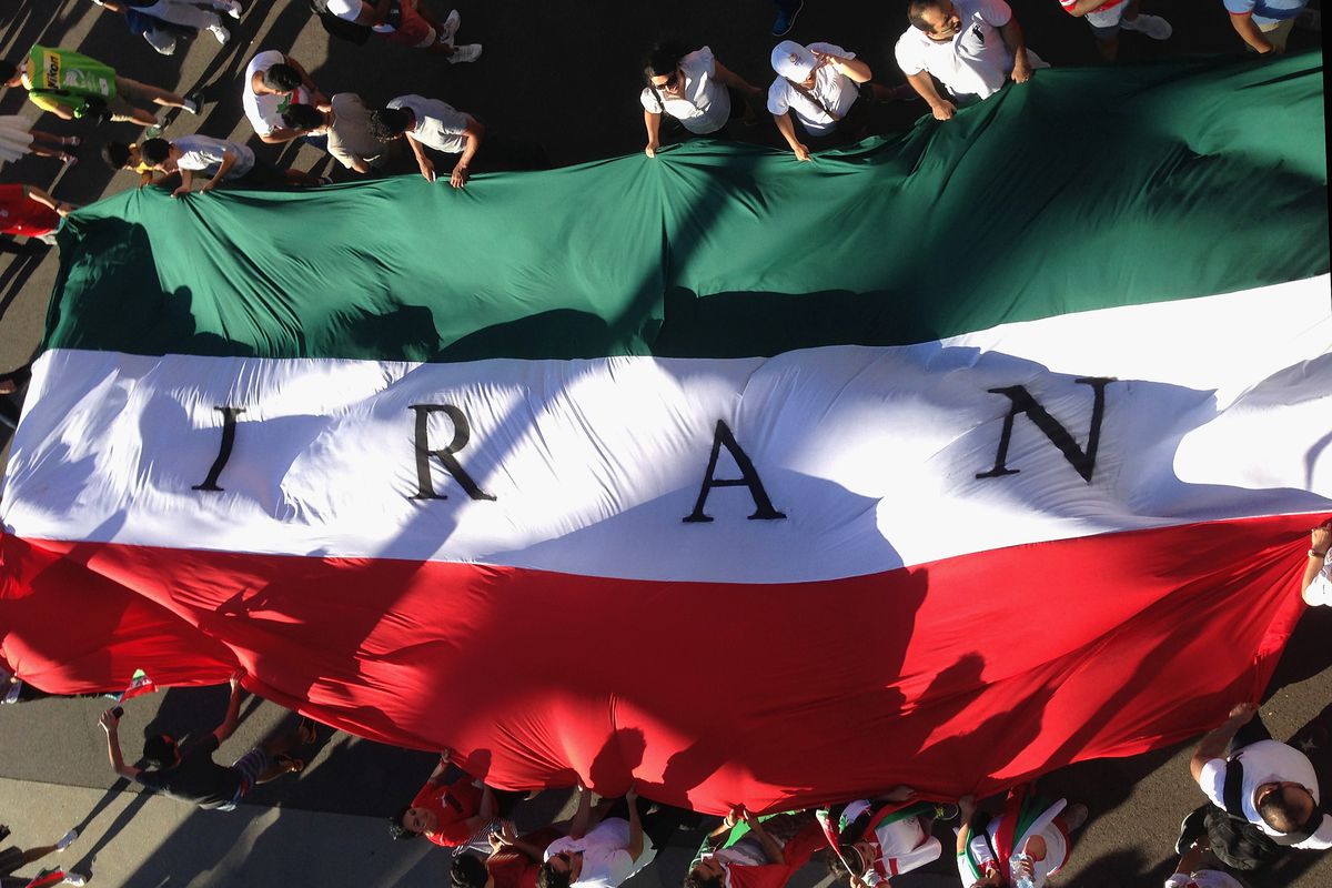 Iran fans hold up a giant flag during the 2015 Asian Cup match between Iran and Bahrain at AAMI Park on January 11, 2015 in Melbourne, Australia.