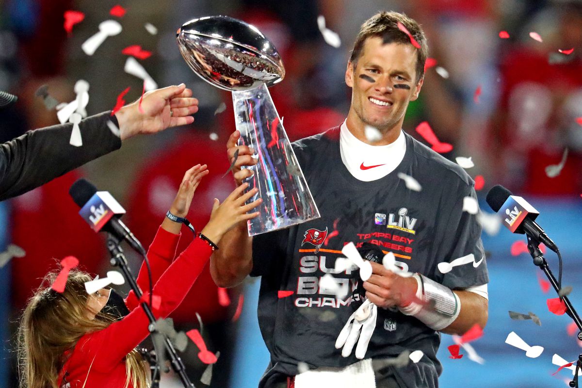 Tampa Bay Buccaneers quarterback Tom Brady (12) celebrates with the Vince Lombardi Trophy after beating the Kansas City Chiefs in Super Bowl LV at Raymond James Stadium.&nbsp;