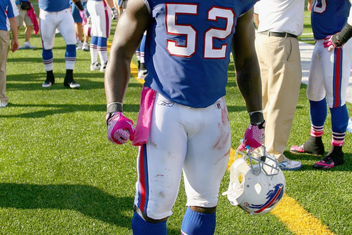 ORCHARD PARK, NY - OCTOBER 09:  Arthur Moats #52 of the Buffalo Bills celebrates a win against the Philadelphia Eagles at Ralph Wilson Stadium on October 9, 2011 in Orchard Park, New York.  Buffalo woin 31-24.  (Photo by Rick Stewart/Getty Images)