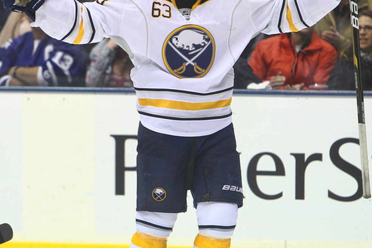 Mar 31, 2012; Toronto, ON, Canada; Buffalo Sabres left wing Tyler Ennis (63) celebrates his goal against the Toronto Maple Leafs at the Air Canada Centre. The Maple Leafs beat the Sabres 4-3. Mandatory Credit: Tom Szczerbowski-US PRESSWIRE
