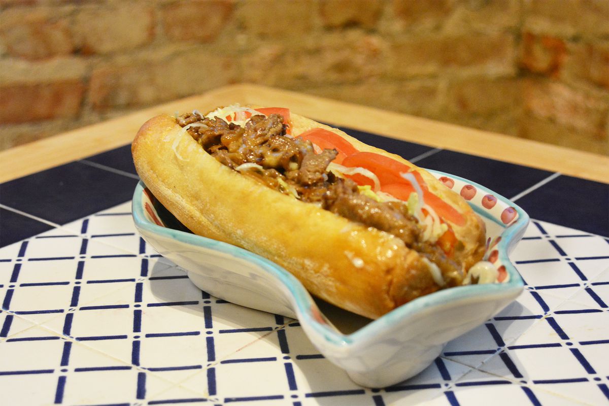 Executive chef Andy Clark’s eponymous “Andy” stars shaved beef, caramelized onions, provolone, and house mayo on a banh mi roll.