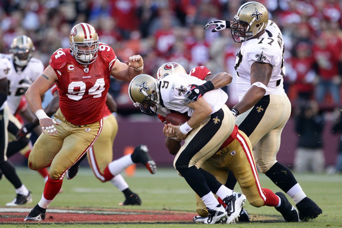 SAN FRANCISCO - SEPTEMBER 20:  Drew Brees #9 of the New Orleans Saints is sacked by Ahmad Brooks #55 of the San Francisco 49ers at Candlestick Park on September 20 2010 in San Francisco California.  (Photo by Ezra Shaw/Getty Images)