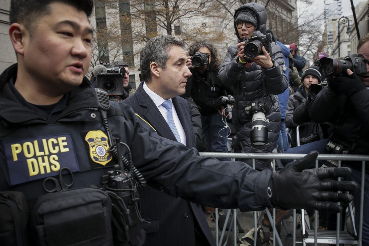 Michael Cohen exits a federal court after a sentencing hearing in December 2018.