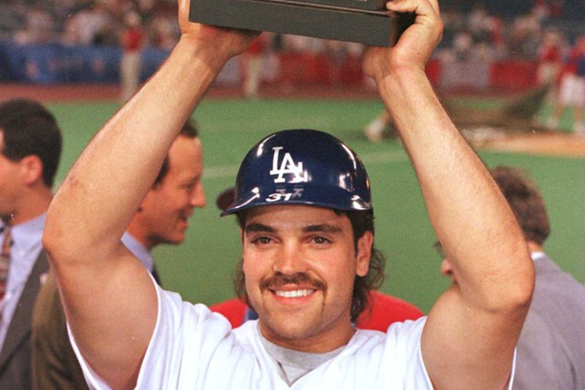 Mike Piazza, during happier times as a Dodger, accpeting the All-Star MVP trophy in 1996
