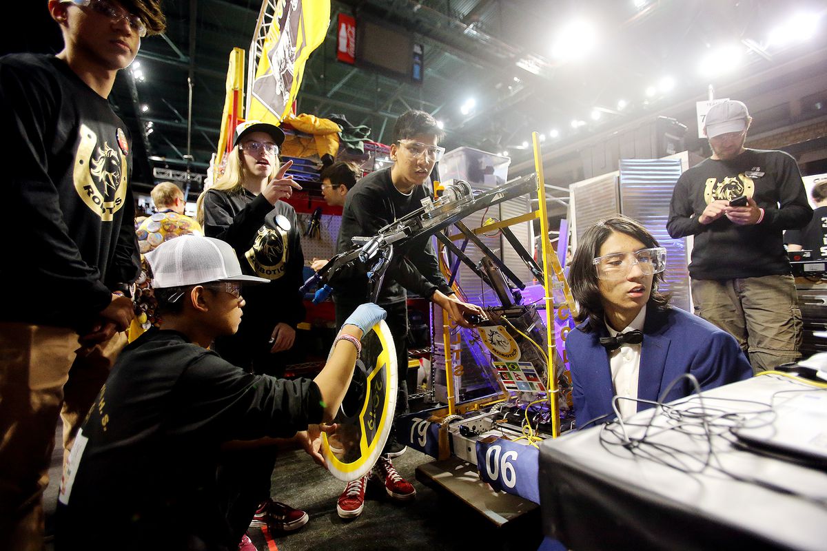 Students from Cottonwood High School work to compete in the First Robotics Competition Utah Regional event at the Maverik Center in West Valley City, Utah, on Friday, March 29, 2019. First — For Inspiration and Recognition of Science and Technology — was 