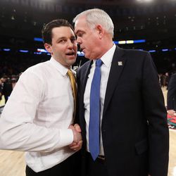 Valparaiso Crusaders head coach Bryce Drew and Brigham Young Cougars head coach Dave Rose talk after BYU falls to Valparaiso in NIT semifinal action at Madison Square Garden in New York City 70-72 Tuesday, March 29, 2016.