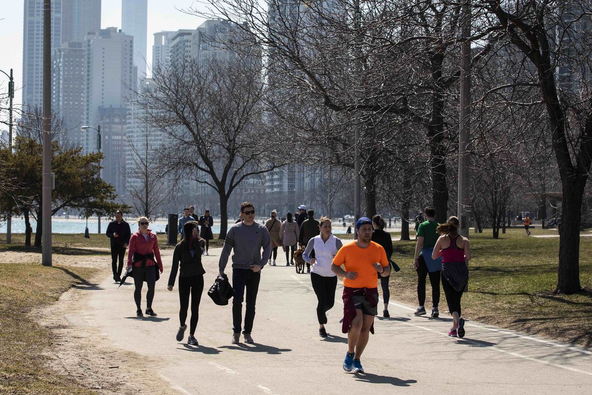 Hundreds of people took advantage of the warm weather on the Lakefront Trail near Oak Street Beach on Wednesday afternoon, but those crowds caused a complete shutdown Thursday.
