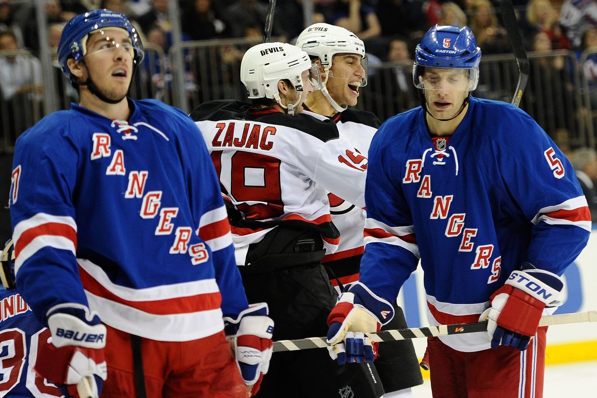 They Didn't Say This But They Could've: "We're losing in Rangerstown, again" - John Moore or Dan Girardi (foreground).  "They call it Rangerstown!" - Dainius Zubrus or Travis Zajac (background)