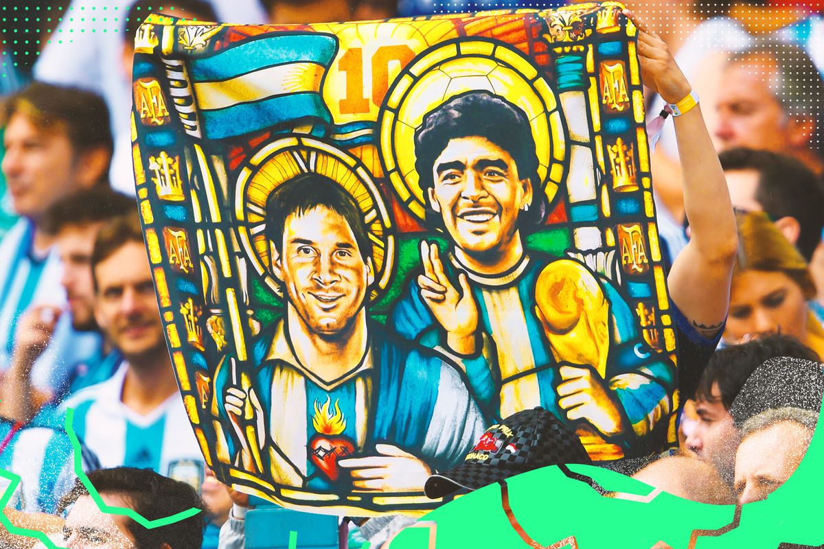 Banner held up by Argentina fans in a crowd depicts Lionel Messi and Diego Maradona painted as saints.