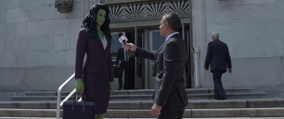 A reporter interviewing She-Hulk on the steps of the courthouse