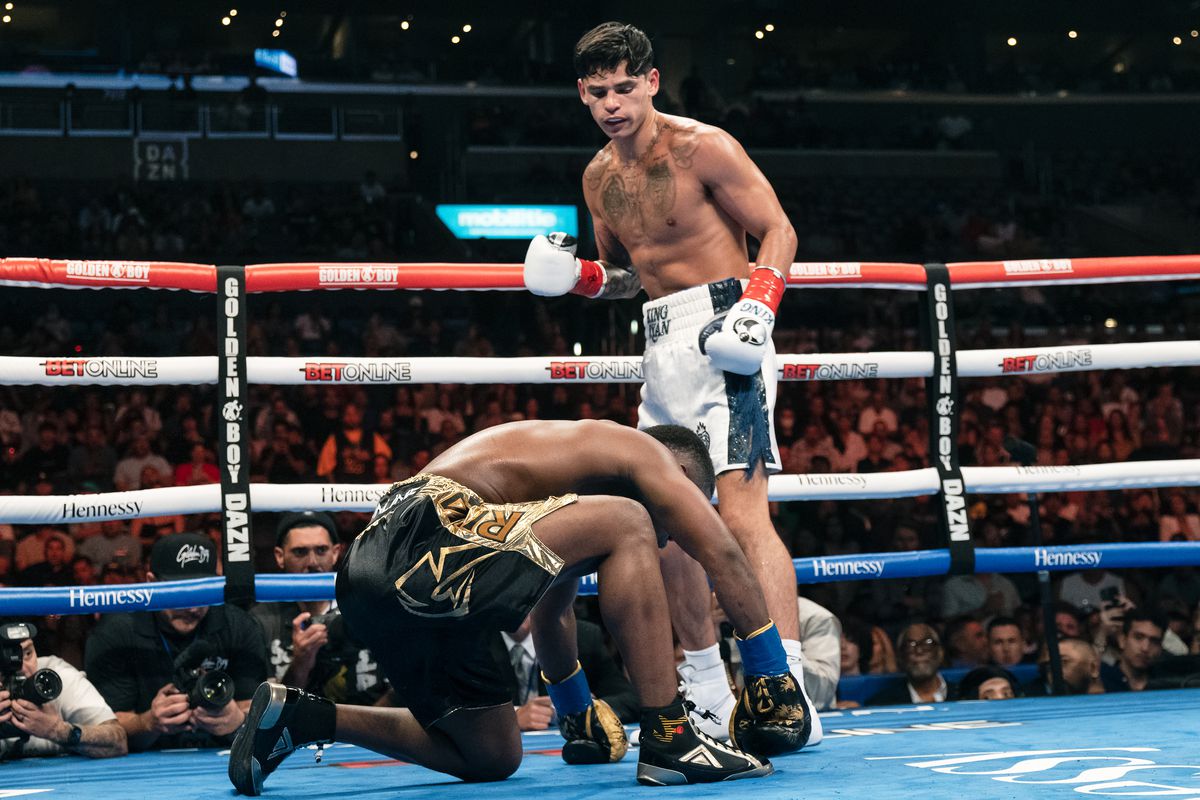 Ryan Garcia stands over Javier Fortuna after knocking him down during their July 2022 bout.