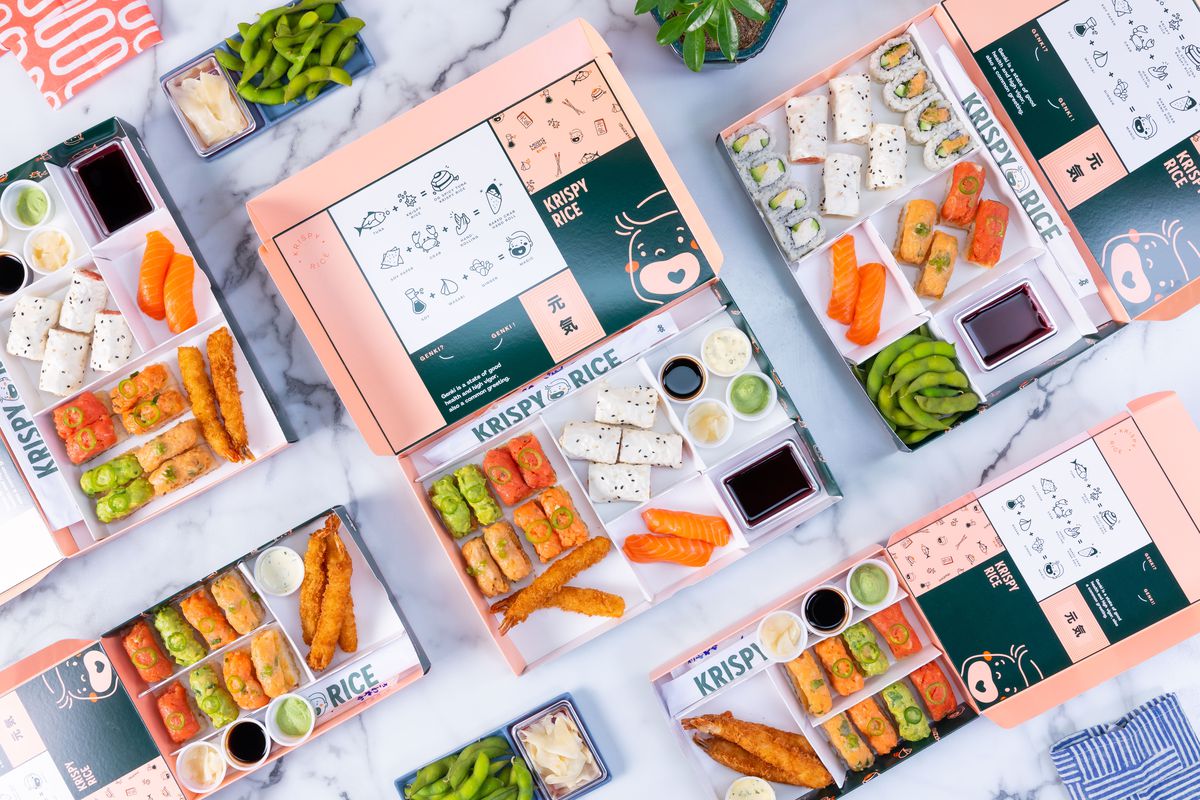 Krispy rice, assorted sushi in a pastel pink disposable bento box