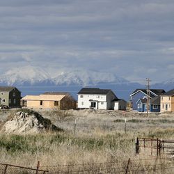 Homes under construction in Stansbury Park are pictured on Wednesday, April 17, 2019. Stansbury Park is a more affordable area compared to the Wasatch Front, which has been booming due to hot housing market.