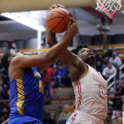 Simeon’s Jeremiah Stamps (15) and Homewood-Flossmoor’s Issac Stanback (0) fight for the ball in Blue Island Friday, March 8, 2019. | Kevin Tanaka/For the Sun Times