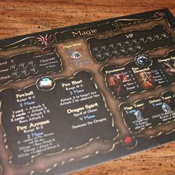 Player boards from Spells of Doom, from Drawlab Entertainment, allow players to track hit points and abilities in the game.