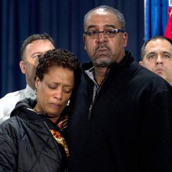 The parents of police officer Jacai Colson, James and Sheila Colson attend a news conference at Prince George's County Police headquarters Monday, March 14, 2016, in Hyattsville, Md. Colson, a four-year veteran of the force was shot outside the District III police station. Colson, a four-year veteran of the force and a undercover narcotics officer was mortally wounded by his own colleagues as he responded to an attack on his police station by a gunman with a death wish, their police chief angrily explained on Monday. 