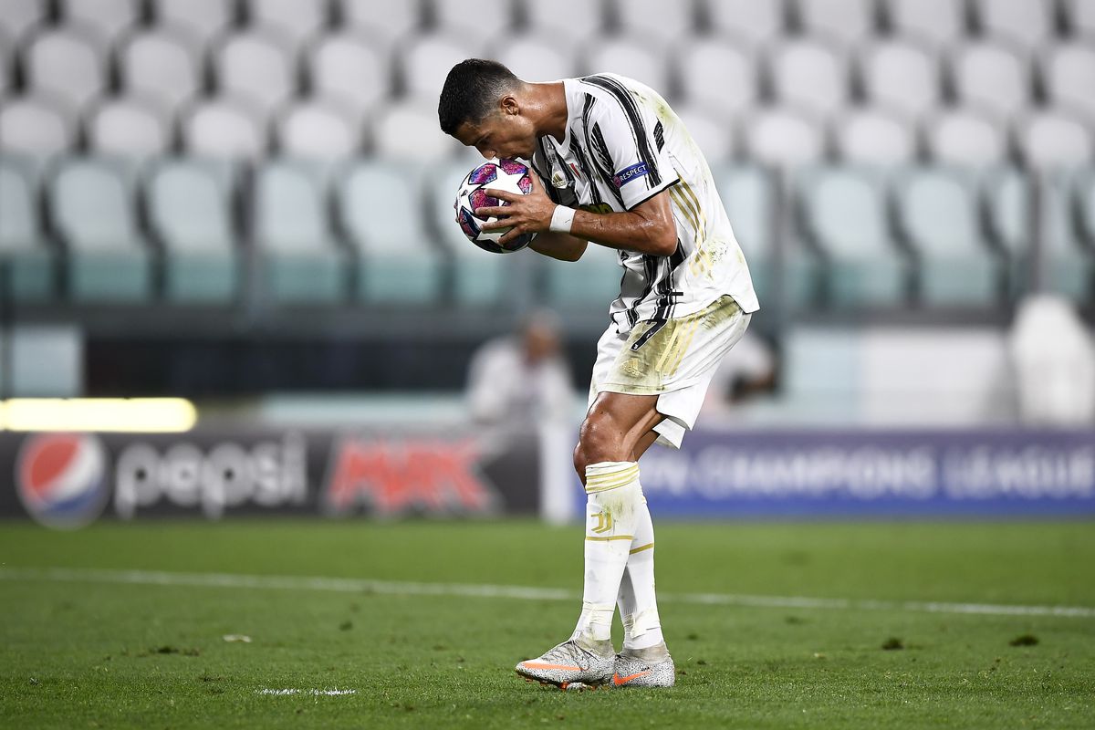 Cristiano Ronaldo of Juventus FC kisses the ball prior to a...