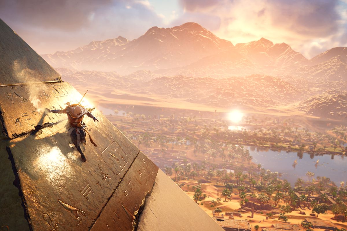 Assassin’s Creed Origins - Bayek scales a pyramid