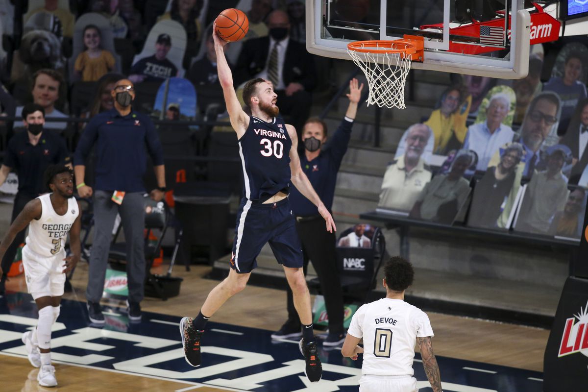 Virginia Cavaliers forward Jay Huff dunks against the Georgia Tech Yellow Jackets in the second half at McCamish Pavilion.